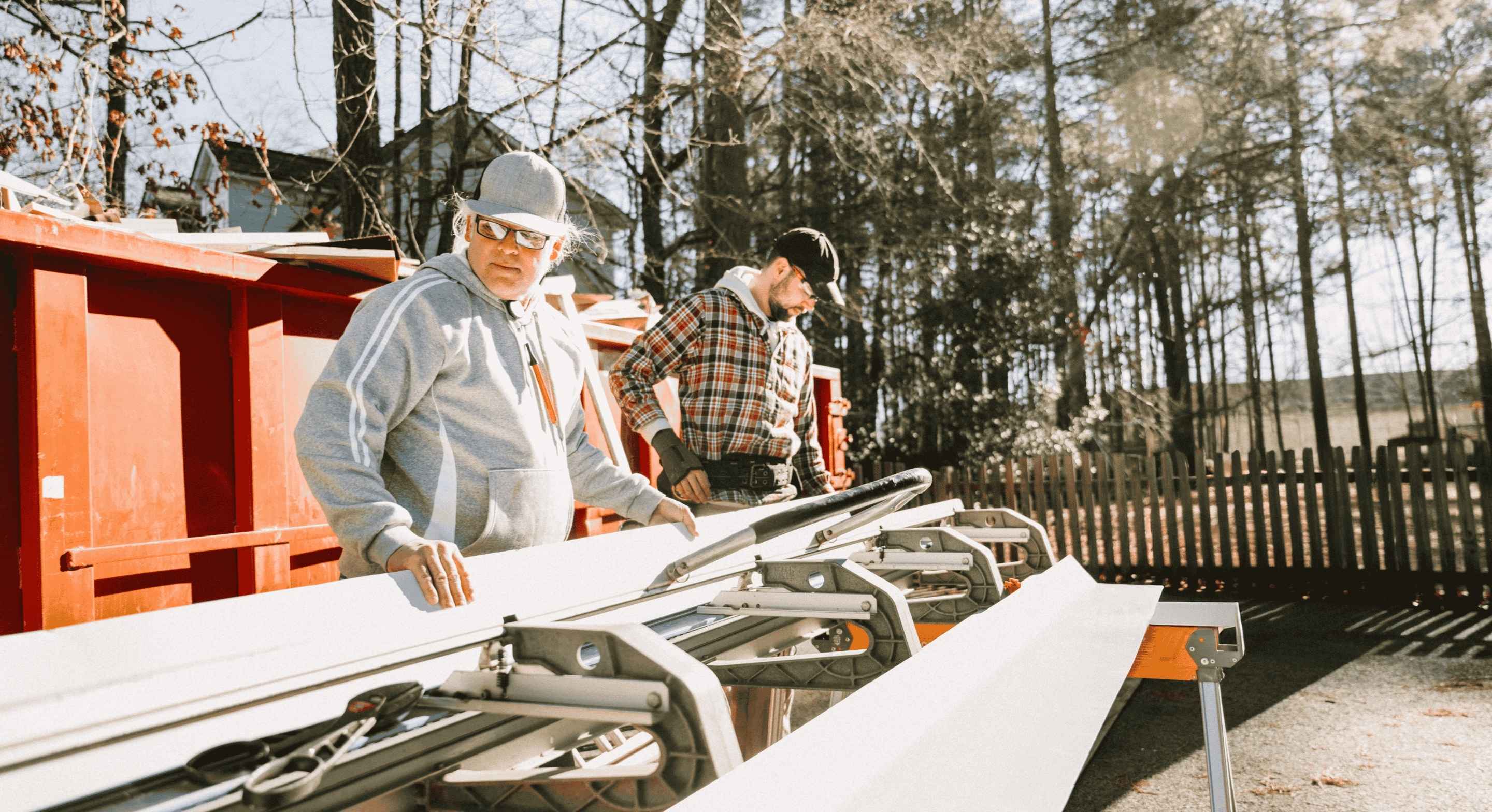 A casual working photo of construction workers while working in the construction site.