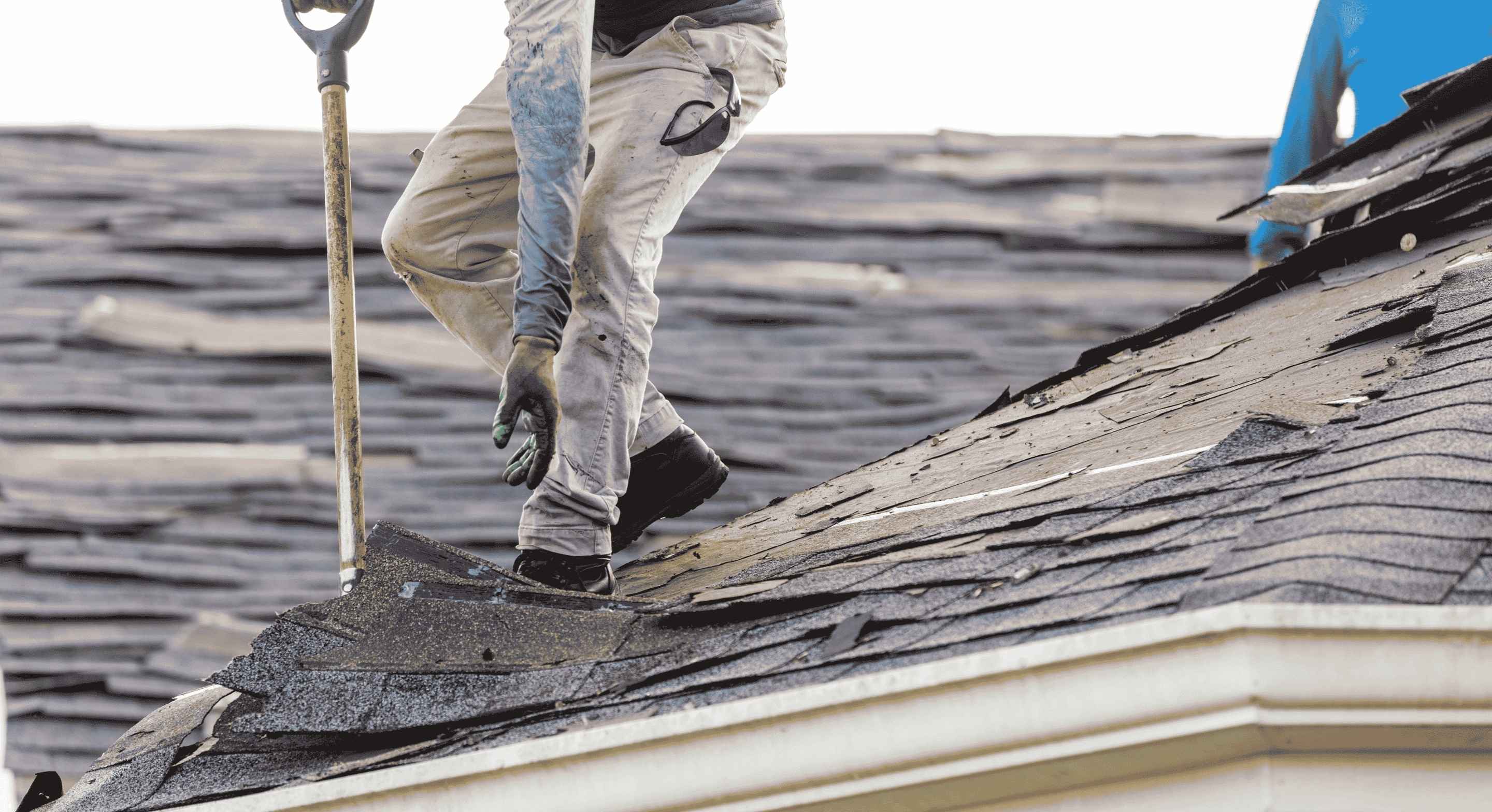Roofing professional image while working on the rooftop